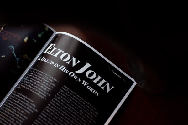 Part of a magazine is shown. The headline of the story reads: Elton John, A Legend in His Own Words. The magazine title, "New Beginnings" is at the top.