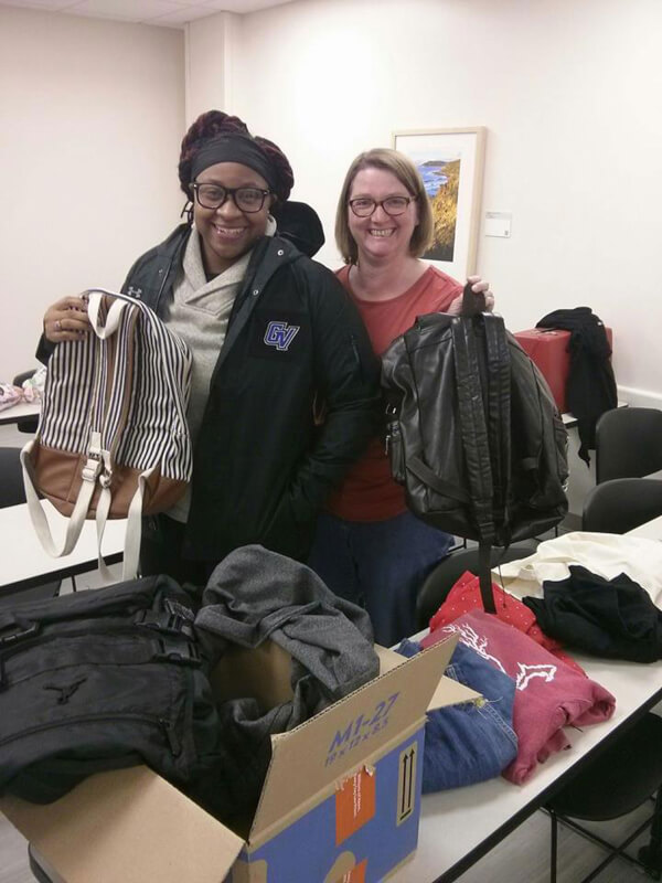 Photo of student and staff member at Repair Clinic