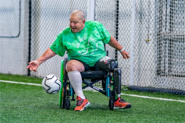 Mary Free Bed Rehabilitation Hospital patient Kathy Klimowicz plays the goalkeeper position as part of an amputee soccer clinic at the Grand Rapids Soccer Society on February 8.