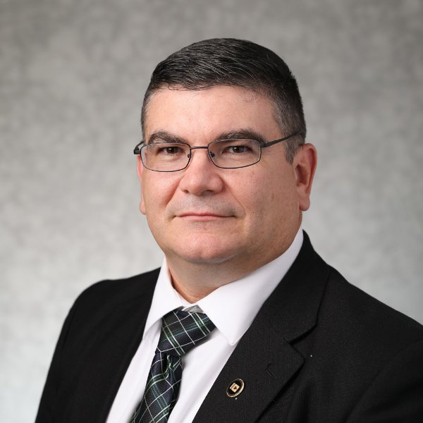 Brent Holmes poses for a headshot