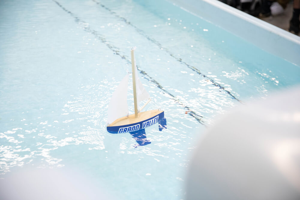 A GVSU-themed sailboat takes to the water.