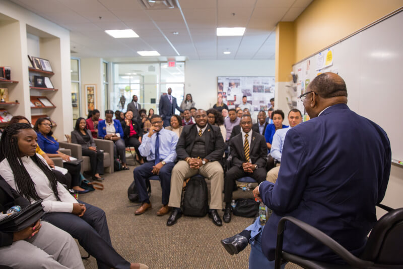 William F. Pickard meets with students.