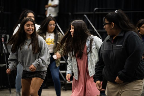 young students dancing on Fieldhouse floor