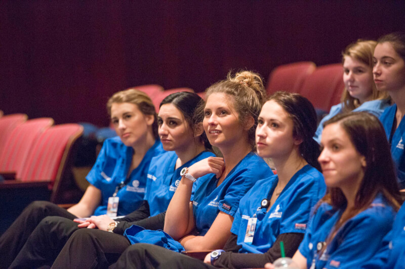 two rows of students in audience