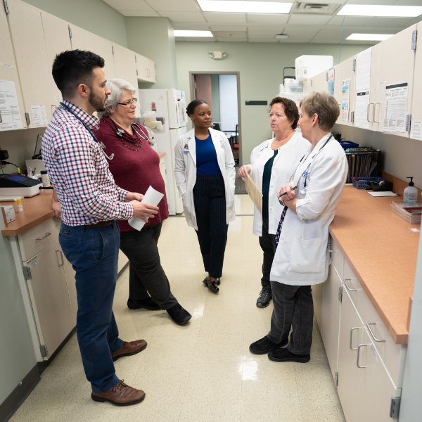 Staff photo of GVSU Family Health Center staff, some in medical coats
