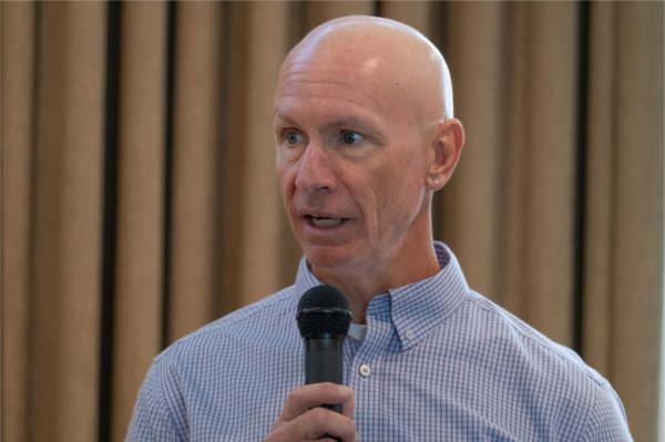 Kevin Ricco, executive director of the Muskegon Innovation Hub, addresses the grant recipients during an event on August 20.