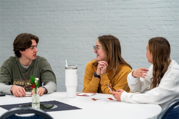 Students discuss during the César Chávez celebration.