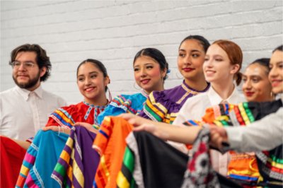 Dancers from the student group Monarcas pose for a photo at the César Chávez celebration.