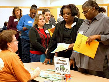 Pictured is a previous poverty simulation sponsored by Access of West Michigan. The Women's Center will host two simulations on Martin Luther King Jr. Day.