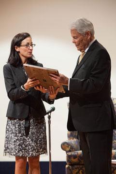 Ralph Hauenstein receives his award from ODK past national president Betsy Bugg Holloway.