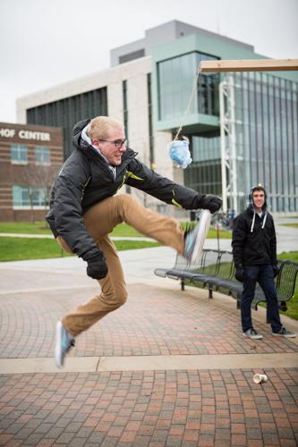A student tries the high kick during the arctic games.