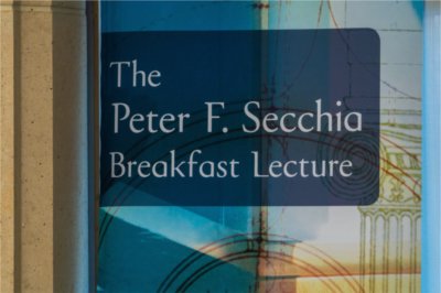 Sign reading "The Peter F. Secchia Breakfast Lecture"