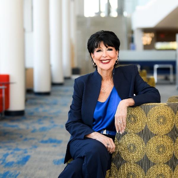 Portrait of GVU President Philomena V. Mantella in a chair.