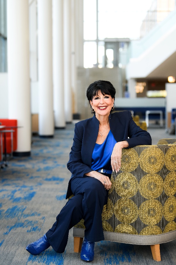 Portrait of GVSU President Philomena V. Mantella sitting in a chair.