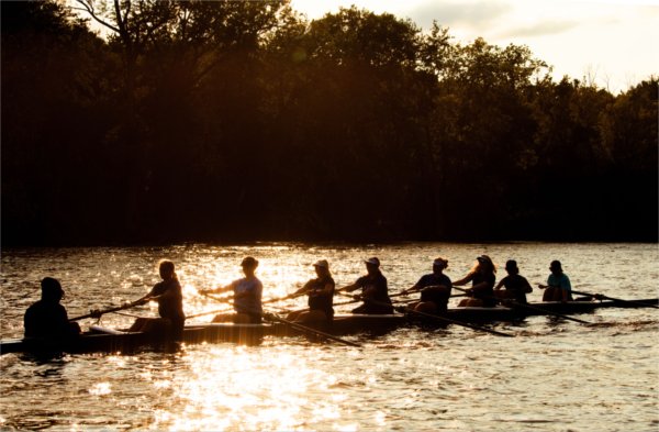 The GVSU Rowing Club practices on the Grand River.