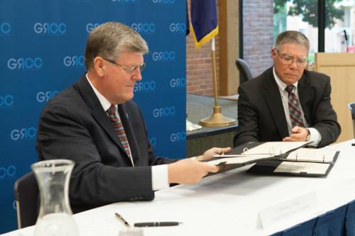 Grand Valley President Thomas J. Haas, left, and GRCC President Steven C. Ender