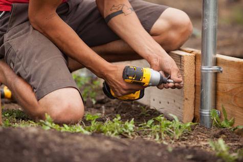 Students, faculty and staff members donated more than 300 hours to build the new hoop house.