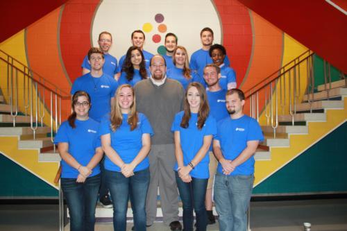 Speech Lab student consultants Brandan Bilski, Jordan Boze, Lena Williams, Chad Rodgers, Kelsey Hines, Ari Zucker, Ashlee Wagner, Jake Nuechterlein, Ellen Packard, Kent Redford, Michelle Marinos, and Isaac Simon, with Speech Lab director Carl Brown.