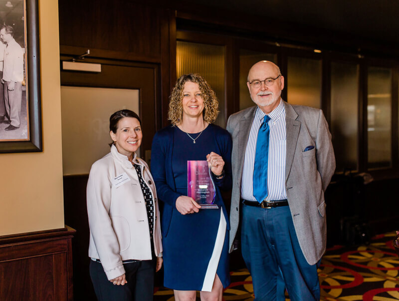 Deborah Herrington pictured with Maria Cimitile, provost and executive vice president for Academic and Student Affairs, and Fred Antczak, CLAS dean