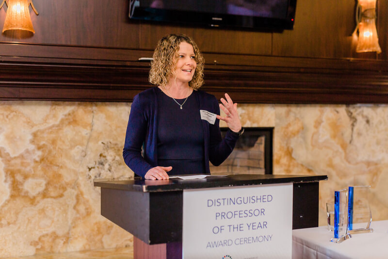 Deborah Herrington accepting the Michigan Distinguished Professor of the Year Award.