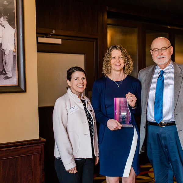 Deborah Herrington pictured with Maria Cimitile, provost and executive vice president for Academic and Student Affairs, and Fred Antczak, CLAS dean