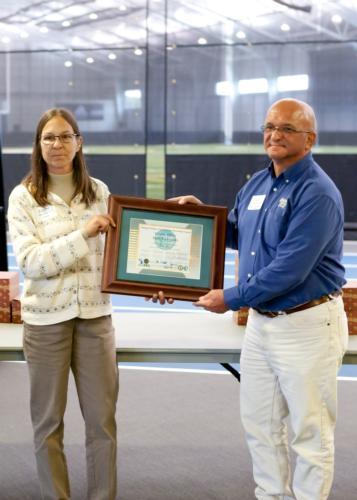 Ken Stanton, right, at the MTESP seminar where Grand Valley was recognized for its recertification.
