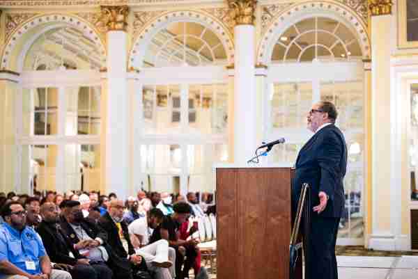 Michael Eric Dyson addresses attendees June 9 at the symposium, held at the Amway Grand Plaza in Grand Rapids.