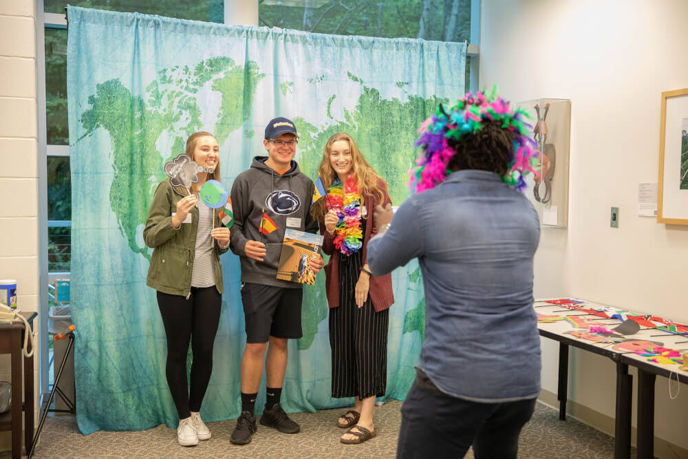 students have fun in a photo booth