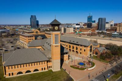 drone photo of Pew Grand Rapids campus with downtown Grand Rapids in background