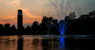 Night view of the pond in Allendale showing the fountain and the carillon.