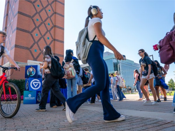Students pick up free t-shirts during the gvsYOU debut brand launch event at the Cook Carillon Tower on September 30.
