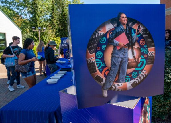 Students pick up free t-shirts during the gvsYOU debut brand launch event at the Cook Carillon Tower on September 30.