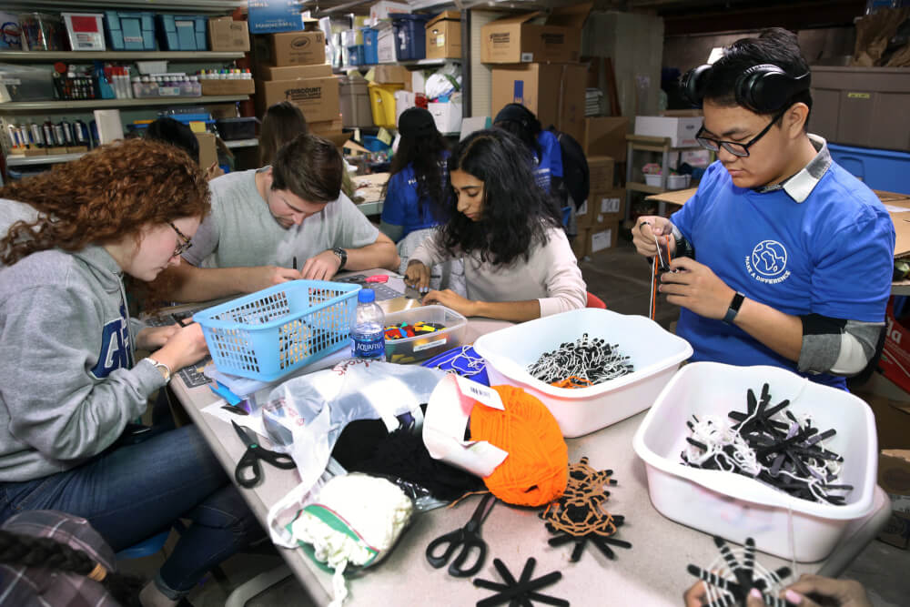 Students make Halloween crafts at the Grand Rapids Children's Museum.