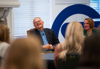 Bror Saxberg laughs following a comment during the President's Forum on October 25.