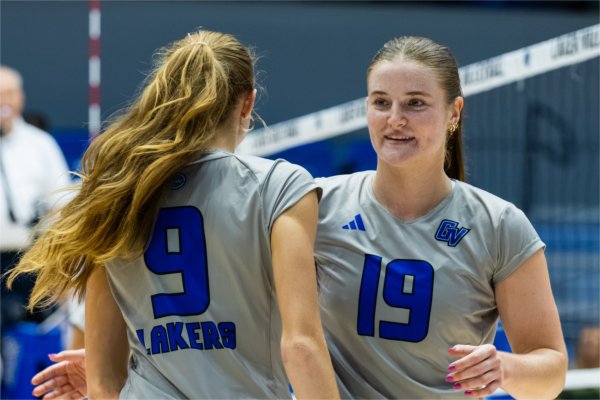 Gabby Orlet greets Laene Voortman during a match against Northwood at the Hampton Inn and Suites Grand Rapids Downtown Classic on September 3, 2026.