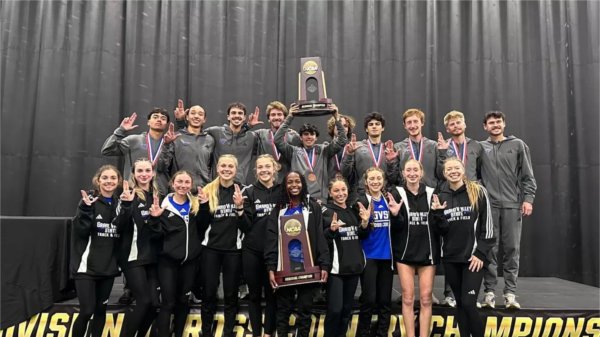 The GVSU men's and women's cross country teams celebrate winning the NCAA Midwest Region Championships.