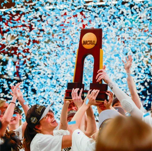 The GVSU women�s basketball team celebrates with the national championship trophy on March 28 at UPMC Cooper Fieldhouse.