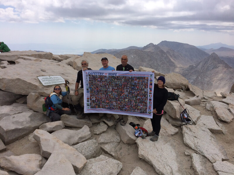 Julie Jumisko is pictured with other hikers on top of Mount Whitney.