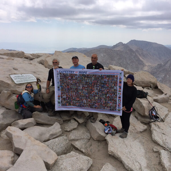 Julie Jumisko is pictured with other hikers on top of Mount Whitney.