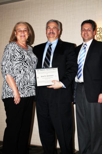 From left, Naomi Powell, awards committee chair for CEED; Paul Plotkowski, dean of PCEC; and Chris Plouff, interim director of the School of Engineering.