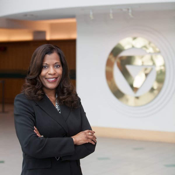 Valerie Rhodes-Sorrelle, vendor relations manager for Procurement Services, stands in front of the GV in the Student Services Building.
