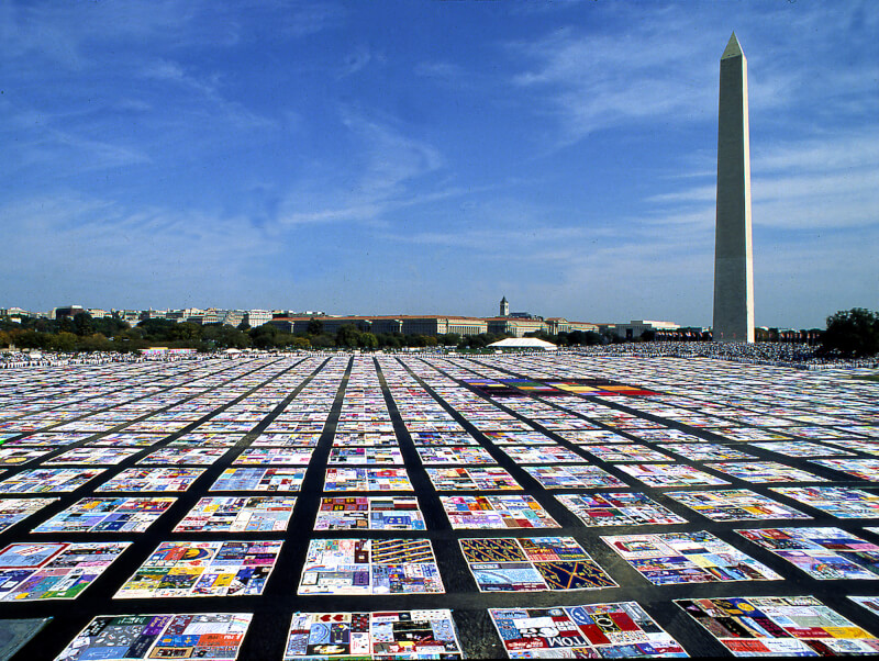 pieces of AIDS quilt on ground in Washington, D.C.