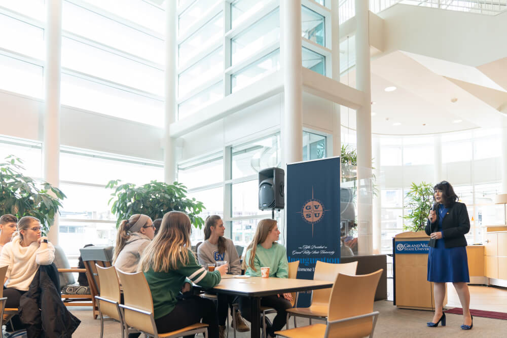 President Mantella talking to room of people