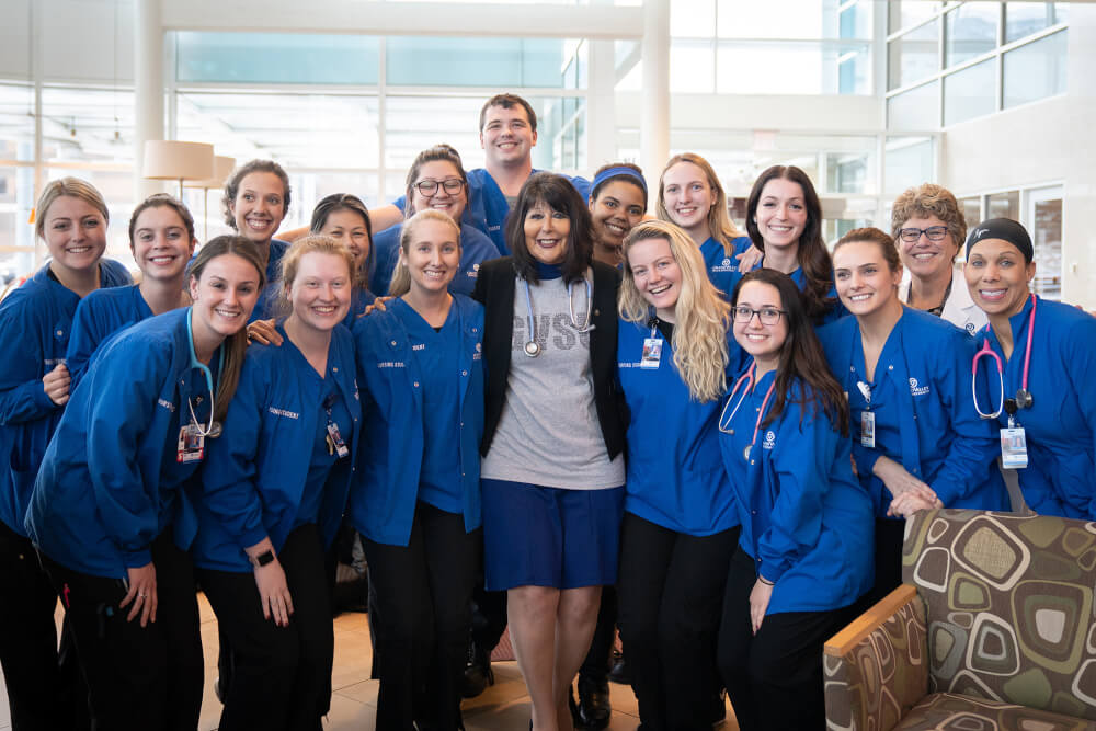 President Mantella poses with nursing students