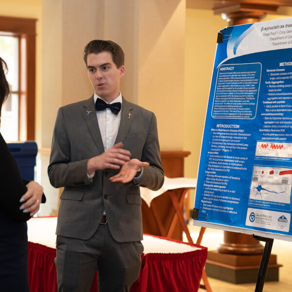 student talking with President Mantella