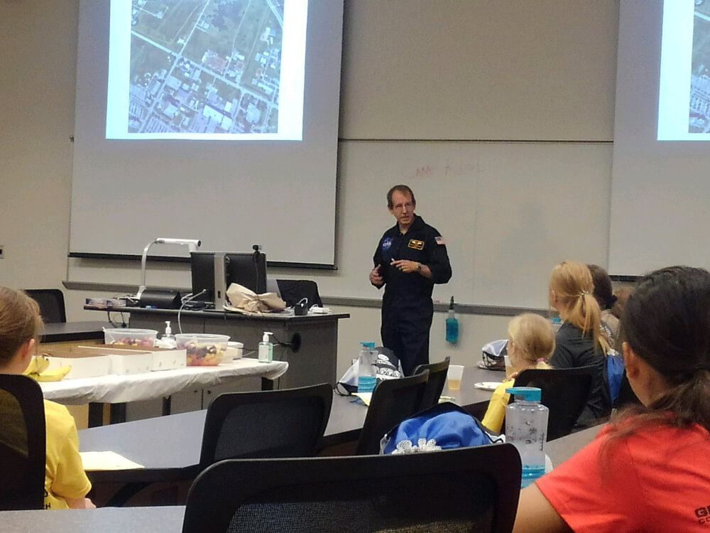 man in front of classroom