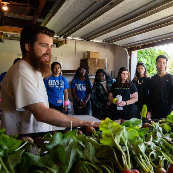Students at College Prep Week get a tour of GVSU's Sustainable Farm Project.