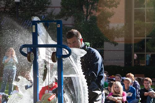 Grand Valley-authorized charter school students watch an ice carving demonstration during ArtPrize 2012.