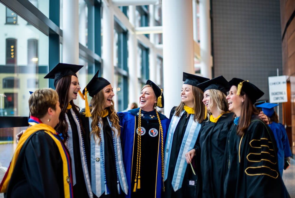group of graduate students in arena