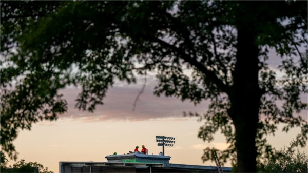 Two people work on construction projects at Lubbers Stadium. 